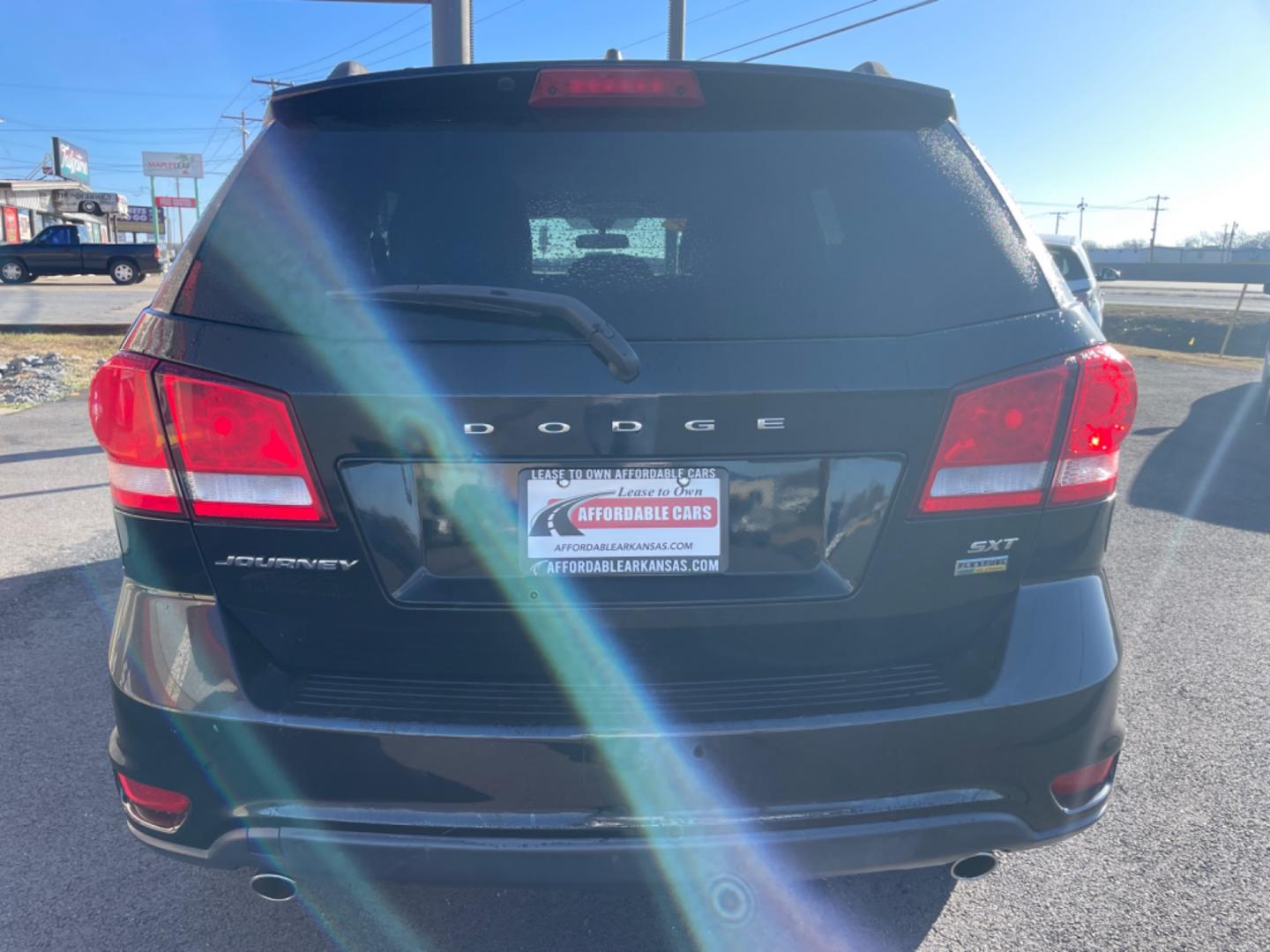 2017 Black Dodge Journey (3C4PDCBGXHT) with an V6, 3.6 Liter engine, Auto, 6-Spd AutoStick transmission, located at 8008 Warden Rd, Sherwood, AR, 72120, (501) 801-6100, 34.830078, -92.186684 - Photo#6